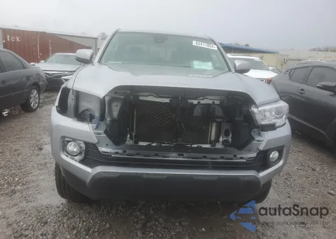 2021 Toyota Tacoma Double Cab from USA, damaged, VIN 5TFAZ5CN2MX104288